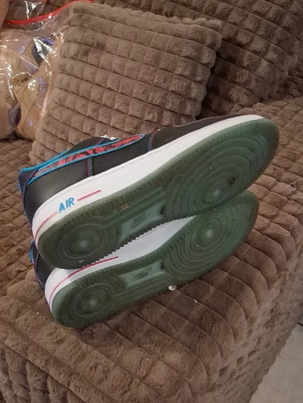 Nike Black Sneakers with Blue Lining and Red Patterned Swoosh